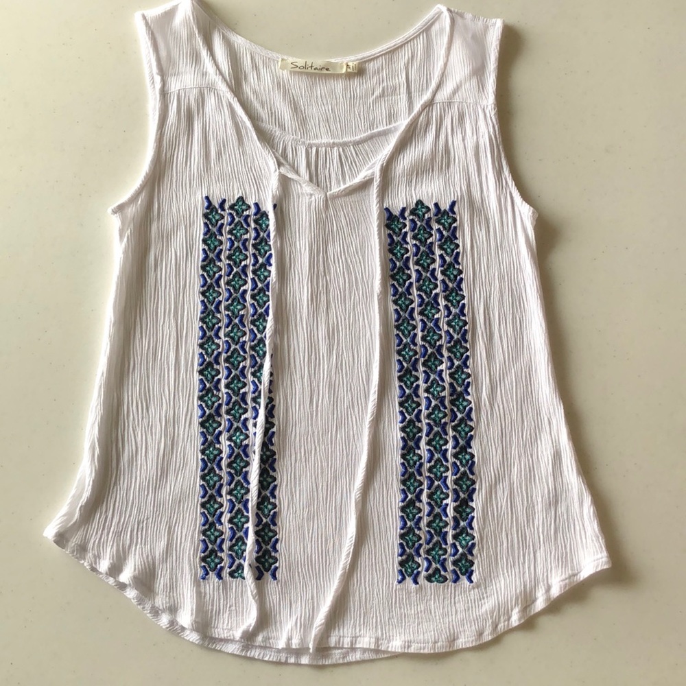 Women’s white tank top with vertical embroidery